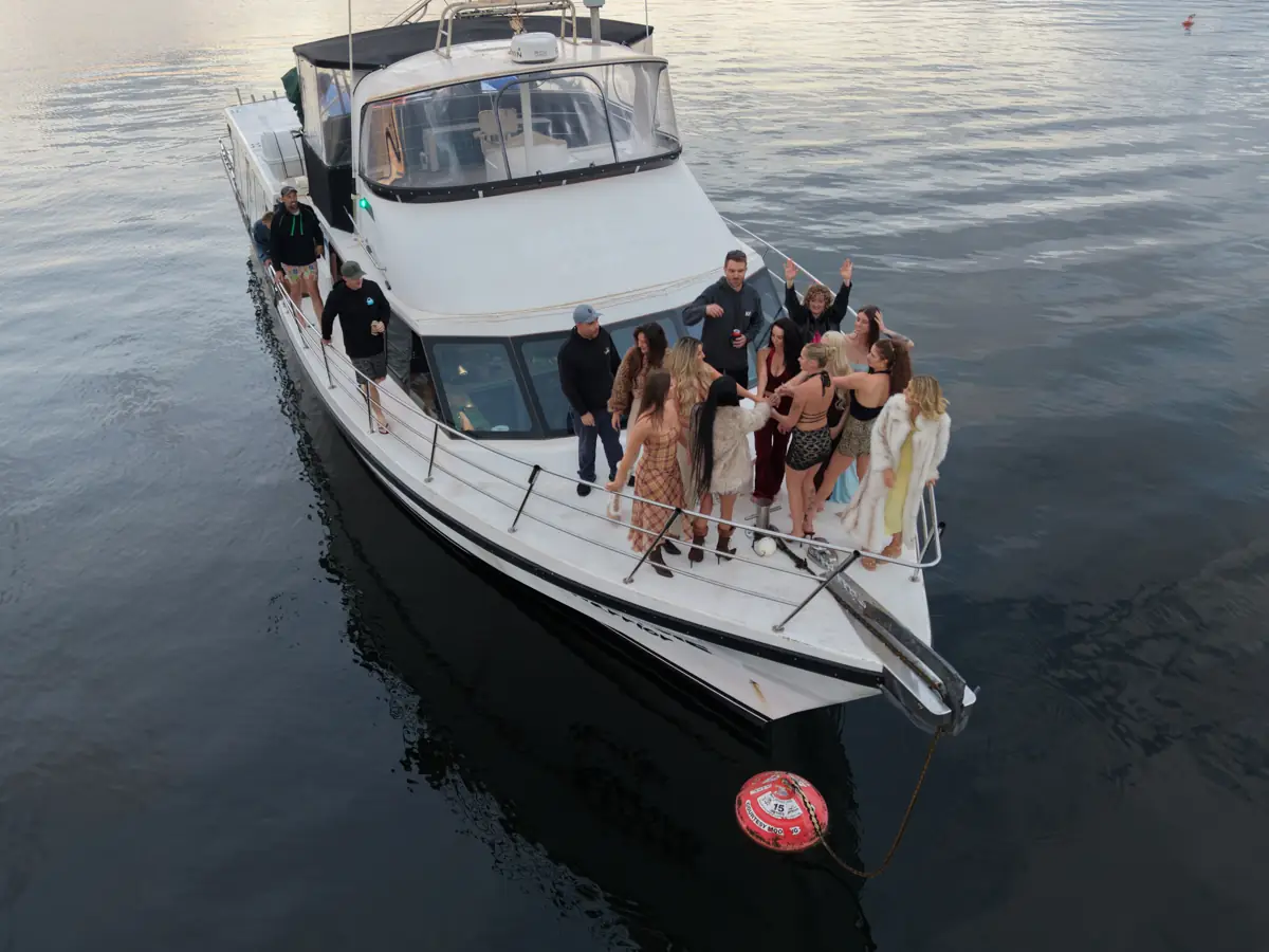 A group on the bow of the boat